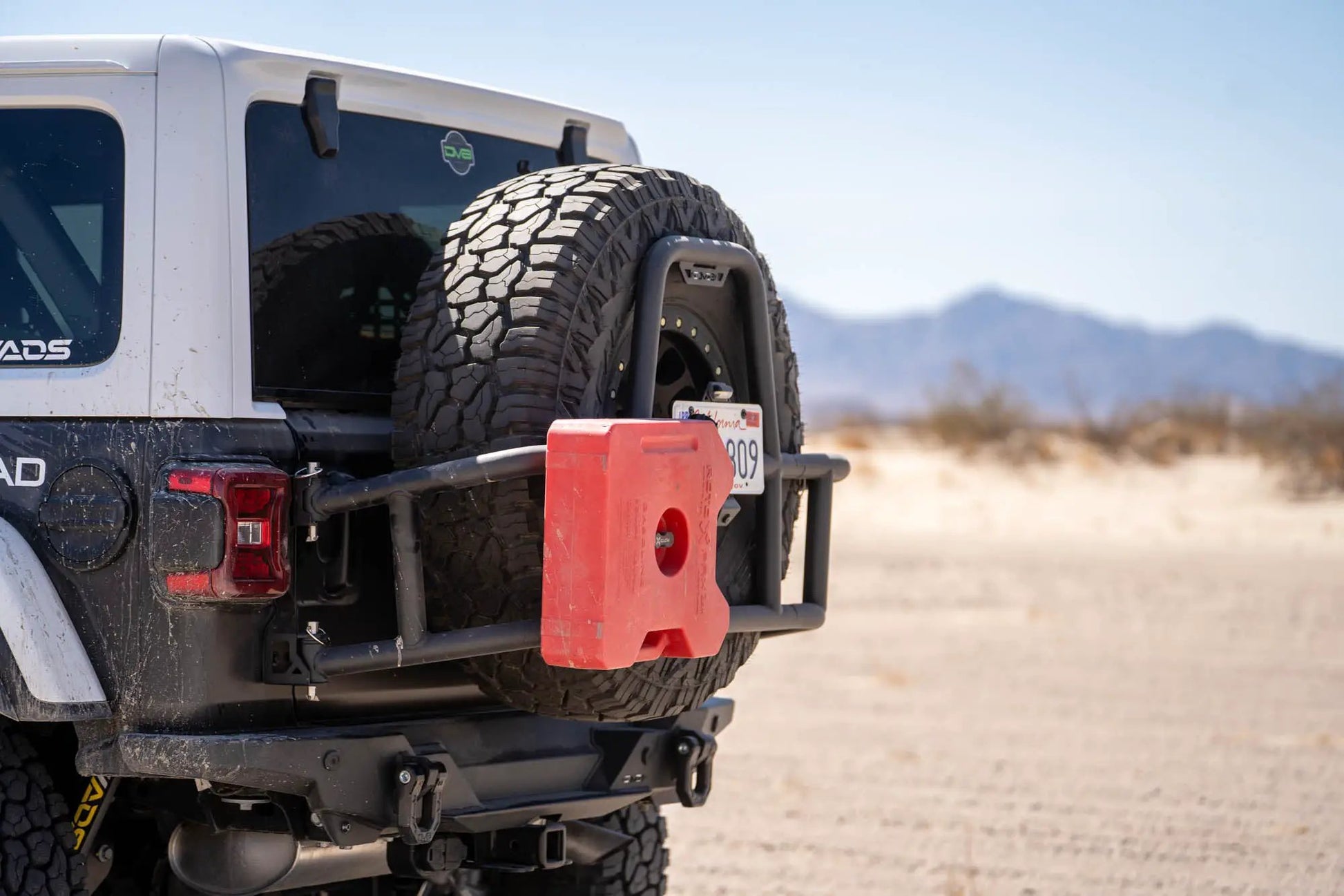 DV8 Offroad 2018-2025 Jeep Wrangler JL Body Mounted Tire Carrier by DV8 Offroad