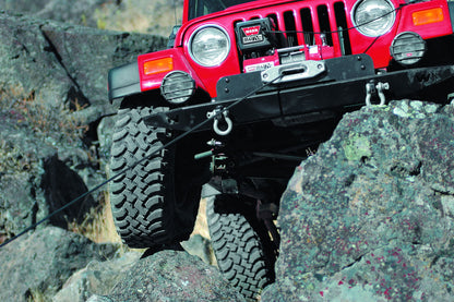 Warn Vehicle Mounted; Vehicle Recovery Winch; 12 Volt Electric; 9000 Pound Line Pull Capacity; 100 Foot Wire Rope; Roller Fairlead; Wired Remote; Planetary Gear Drive; Requires Winch Carrier or Winch Mount