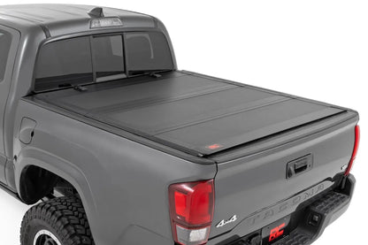 Rough Country Hard Tri-Fold Flip Up Bed Cover | 5' Bed | Toyota Tacoma 2WD/4WD (2005-2015) by Rough Country