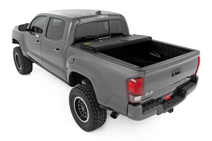 Rough Country Hard Tri-Fold Flip Up Bed Cover | 5' Bed | Toyota Tacoma 2WD/4WD (2005-2015) by Rough Country