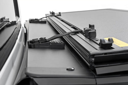 Rough Country Hard Tri-Fold Flip Up Bed Cover | 5'7" | Toyota Tundra 2WD/4WD (2022-2026) by Rough Country