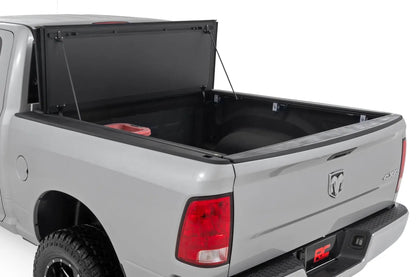 Rough Country Hard Tri-Fold Flip Up Bed Cover | 5'7" Bed | Ram 1500 2WD/4WD (2009-2018 & Classic) by Rough Country