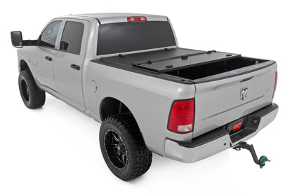 Rough Country Hard Tri-Fold Flip Up Bed Cover | 5'7" Bed | Ram 1500 2WD/4WD (2009-2018 & Classic) by Rough Country