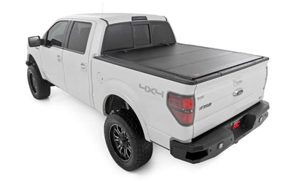 Rough Country Hard Tri-Fold Flip Up Bed Cover | 6'7" Bed | Ford F-150 2WD/4WD (2004-2014) by Rough Country