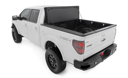 Rough Country Hard Tri-Fold Flip Up Bed Cover | 5'7" Bed | Ford F-150 2WD/4WD (2004-2014) by Rough Country