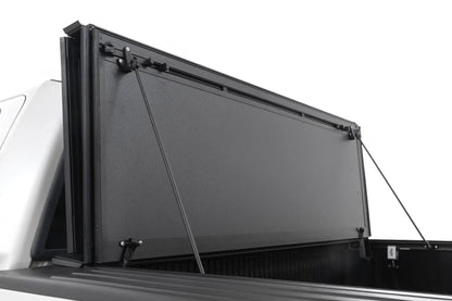 Rough Country Hard Tri-Fold Flip Up Bed Cover | 5'7" Bed | Ford F-150 2WD/4WD (2004-2014) by Rough Country