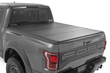 Rough Country Hard Tri-Fold Flip Up Bed Cover | 6'7" Bed | Ford F-150 2WD/4WD (2015-2025) by Rough Country
