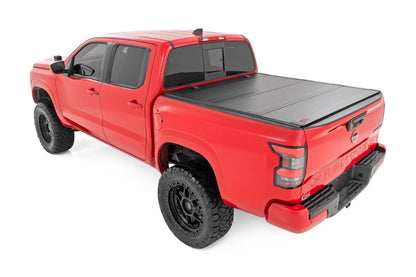 Rough Country Hard Tri-Fold Flip Up Bed Cover | 5' Bed | Nissan Frontier 2WD/4WD (22-26) by Rough Country