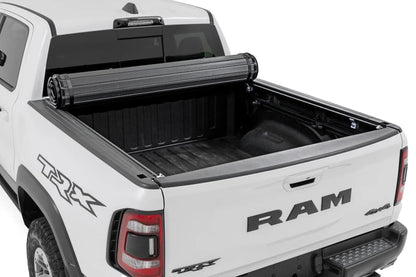 Rough Country Hard Roll Up Bed Cover | 5'7" Bed | Ram 1500 (19-26)/1500 TRX (21-24) by Rough Country