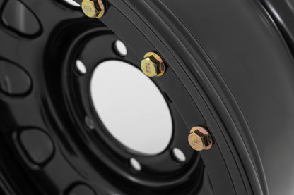 Rueda de acero con aros decorativos tipo "beadlock" simulados | Negro | 17x9 | 5x5 | 3.30 Diámetro central | -12