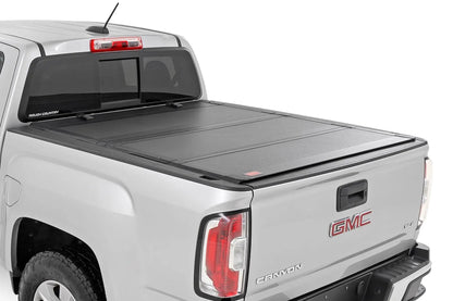Rough Country Hard Tri-Fold Flip Up Bed Cover | 6' Bed | Chevy/GMC Canyon/Colorado (15-26) by Rough Country