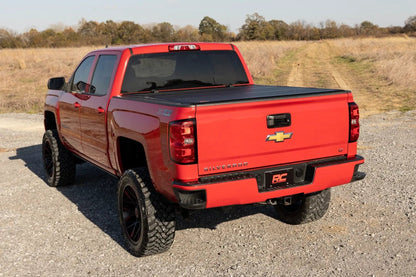 Rough Country Hard Tri-Fold Flip Up Bed Cover | 6'7" Bed | Rail Cap | Chevy/GMC 1500/2500HD/3500HD (14-19) by Rough Country