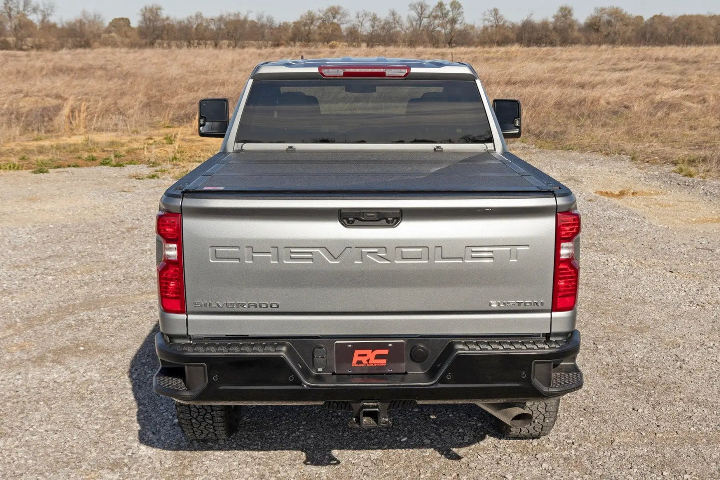 Rough Country Hard Tri-Fold Flip Up Bed Cover | 6'9" Bed | Chevy/GMC Silverado/Sierra 2500HD/3500HD (20-26) by Rough Country
