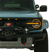 Ford Bronco custom off-road build with upgraded bumper, lights, and adventure accessories