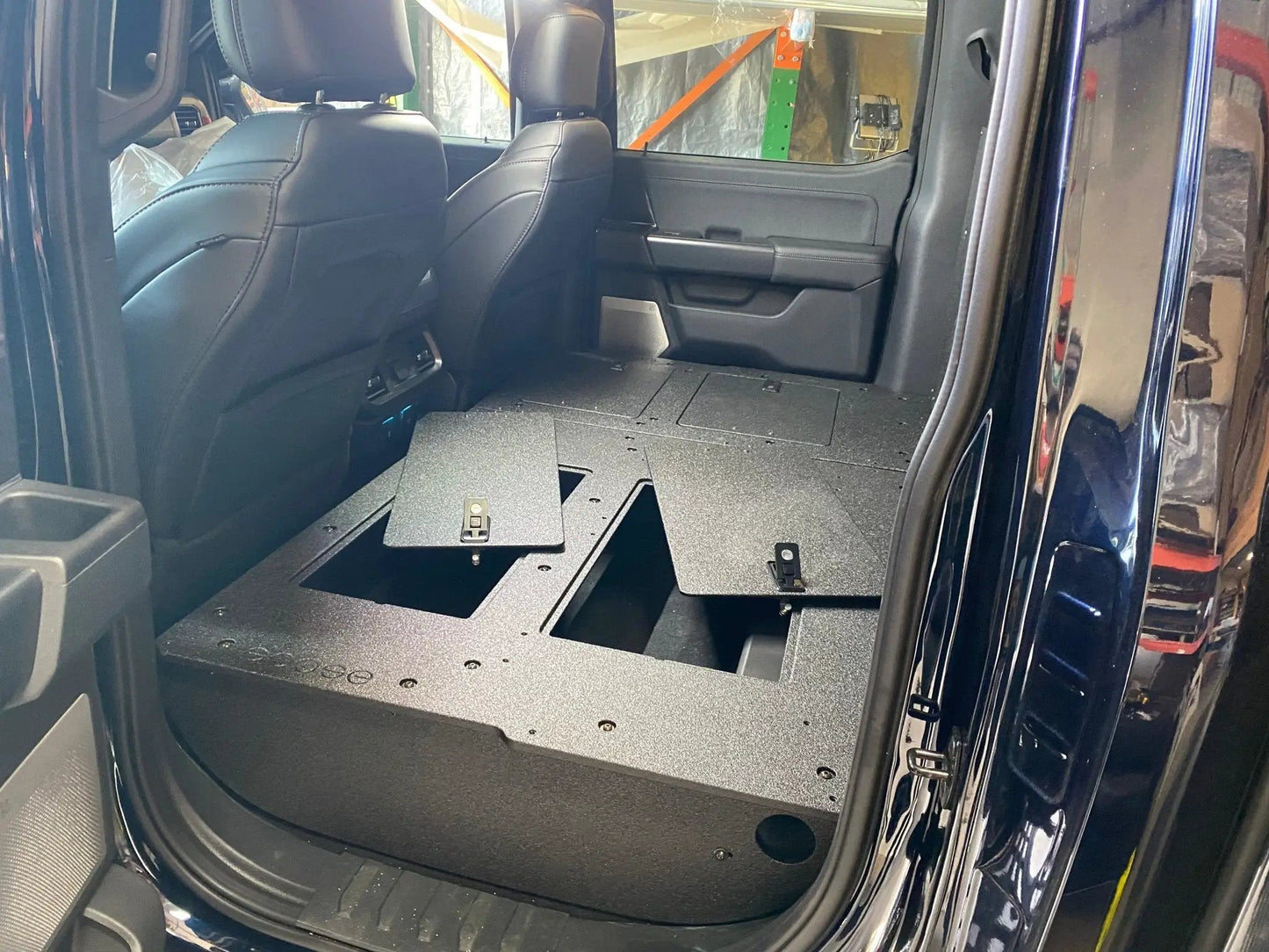 Ford - F150 2021-Present - 14th Gen. SuperCrew - Second Row Seat Delete Plate System with Factory B&O Subwoofer Center Wall with Exterior Port by Goose Gear