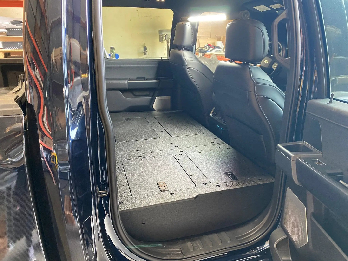 Ford - F150 2021-Present - 14th Gen. SuperCrew - Second Row Seat Delete Plate System with Factory B&O Subwoofer Center Wall with Exterior Port by Goose Gear