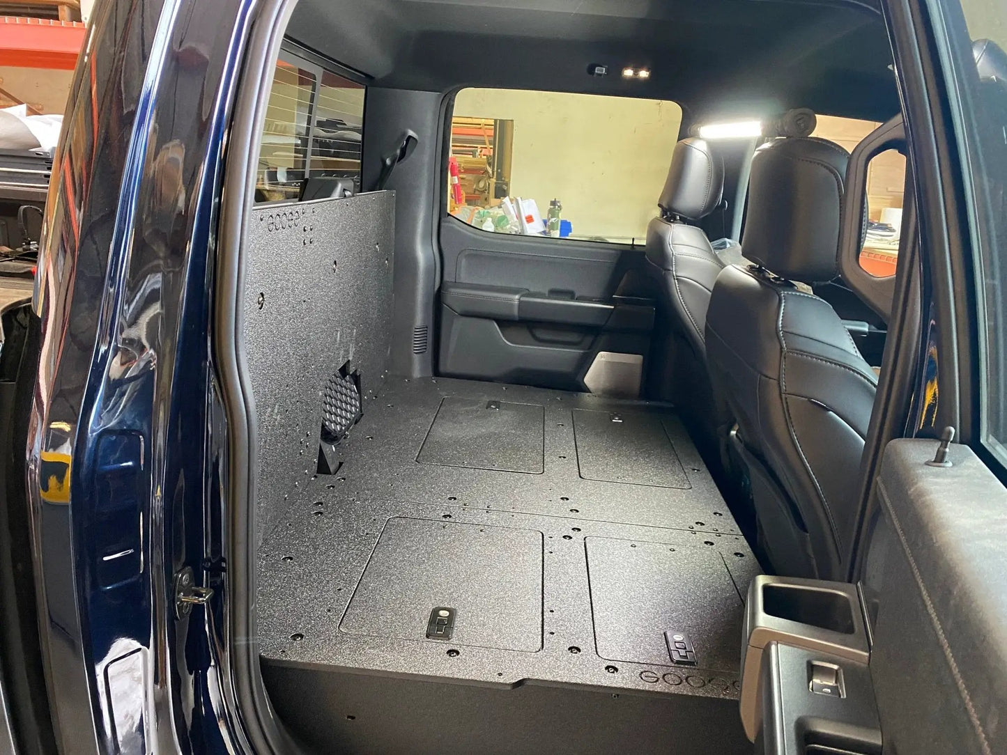 Ford - F150 2021-Present - 14th Gen. SuperCrew - Second Row Seat Delete Plate System with Factory B&O Subwoofer Center Wall with Exterior Port by Goose Gear
