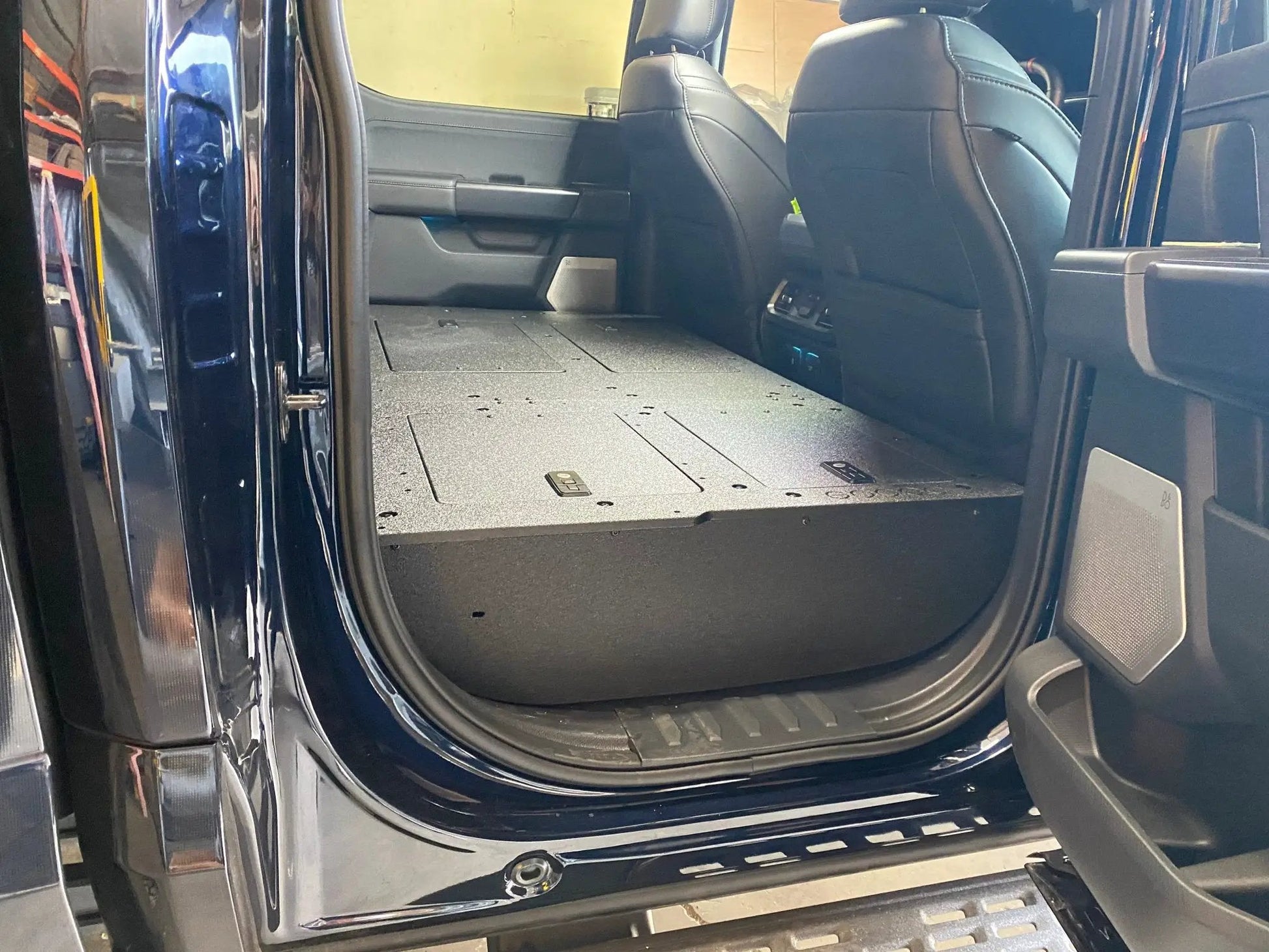 Ford - F150 2021-Present - 14th Gen. SuperCrew - Second Row Seat Delete Plate System with Factory B&O Subwoofer Center Wall with Exterior Port by Goose Gear