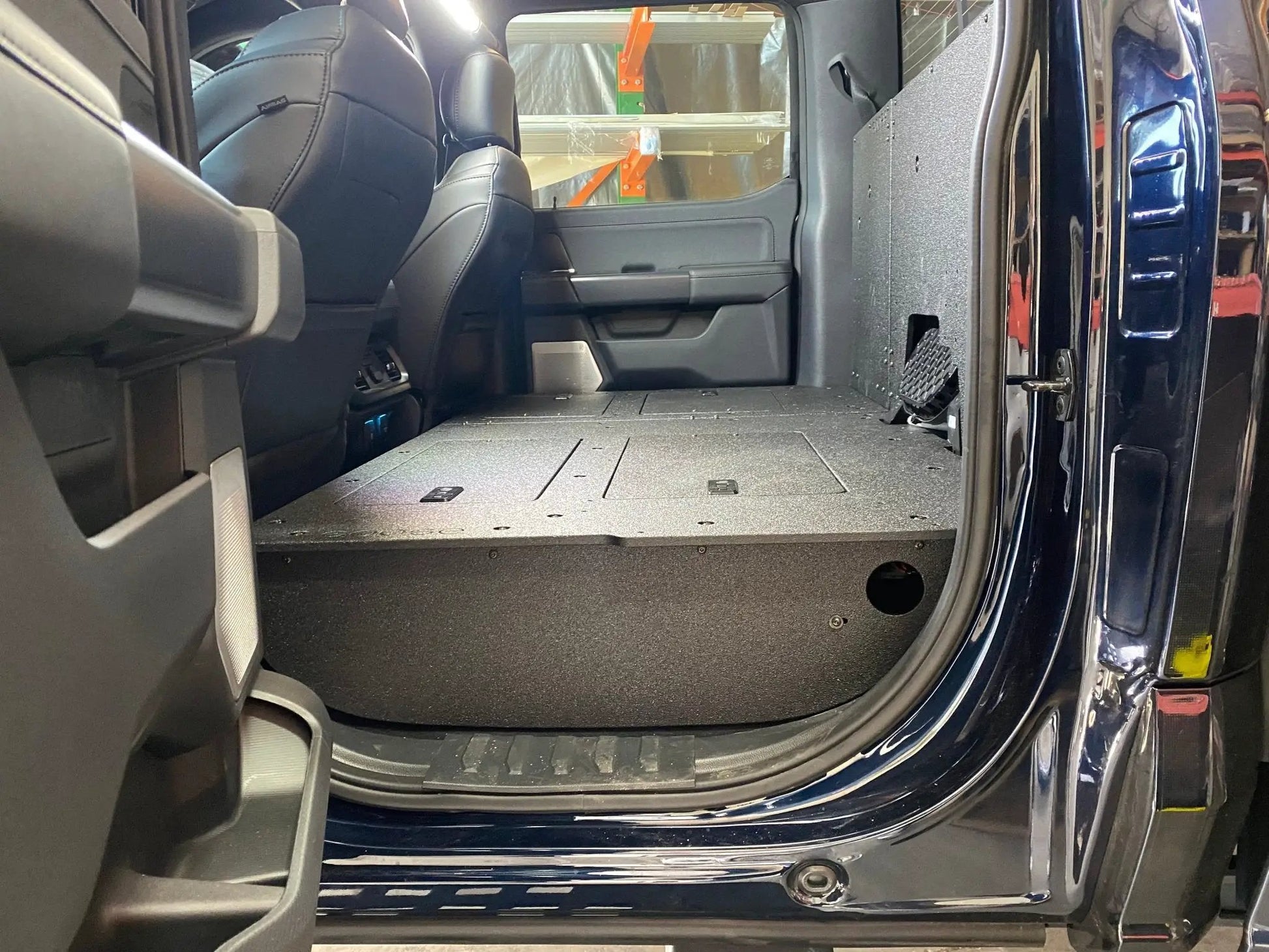 Ford - F150 2021-Present - 14th Gen. SuperCrew - Second Row Seat Delete Plate System with Factory B&O Subwoofer Center Wall with Exterior Port by Goose Gear