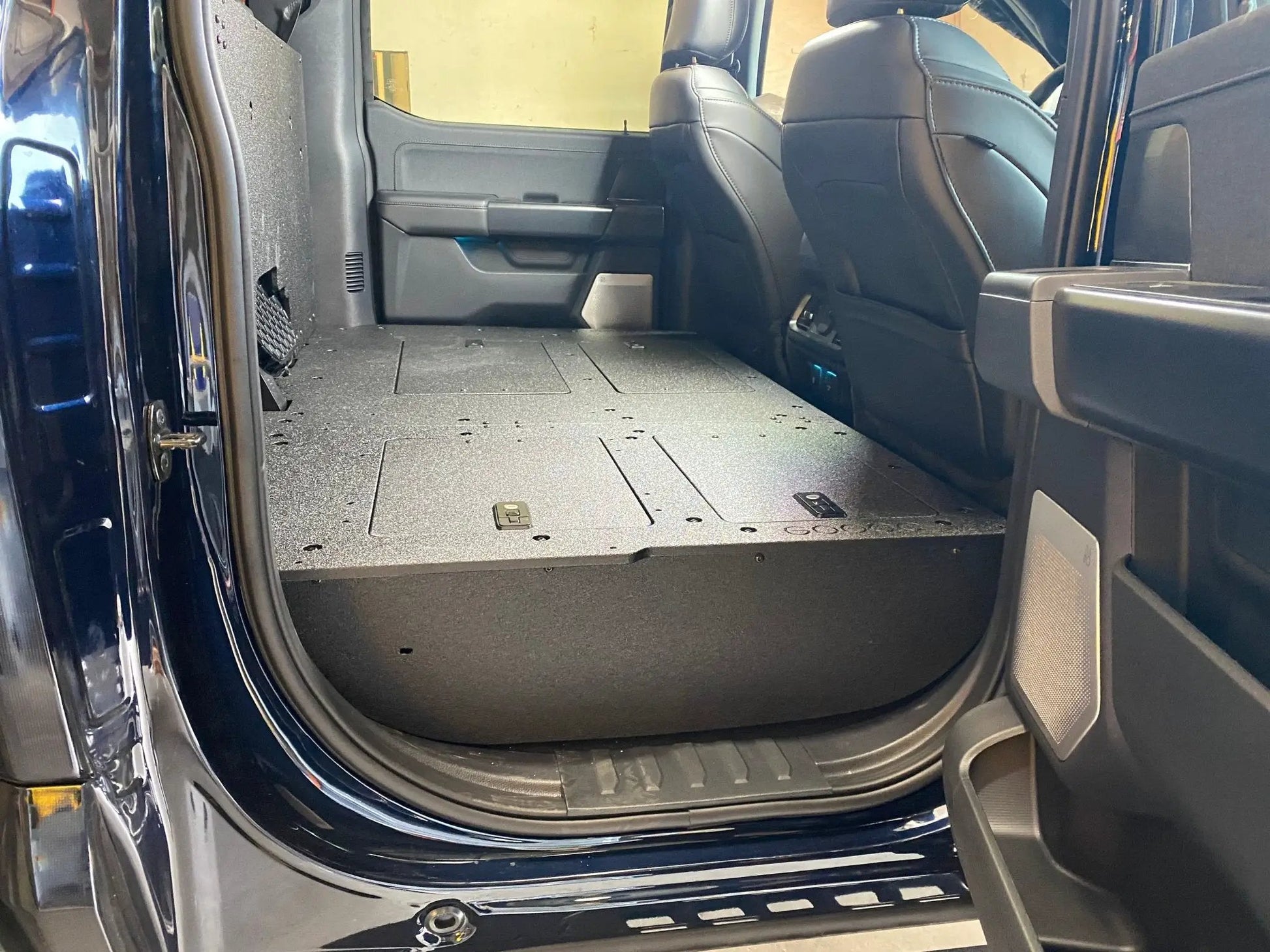 Ford - F150 2021-Present - 14th Gen. SuperCrew - Second Row Seat Delete Plate System with Factory B&O Subwoofer Center Wall with Exterior Port by Goose Gear
