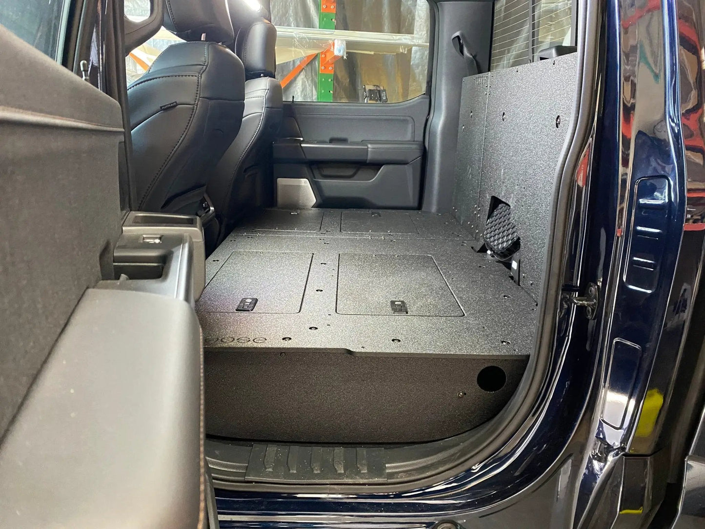 Ford - F150 2021-Present - 14th Gen. SuperCrew - Second Row Seat Delete Plate System with Factory B&O Subwoofer Center Wall with Exterior Port by Goose Gear