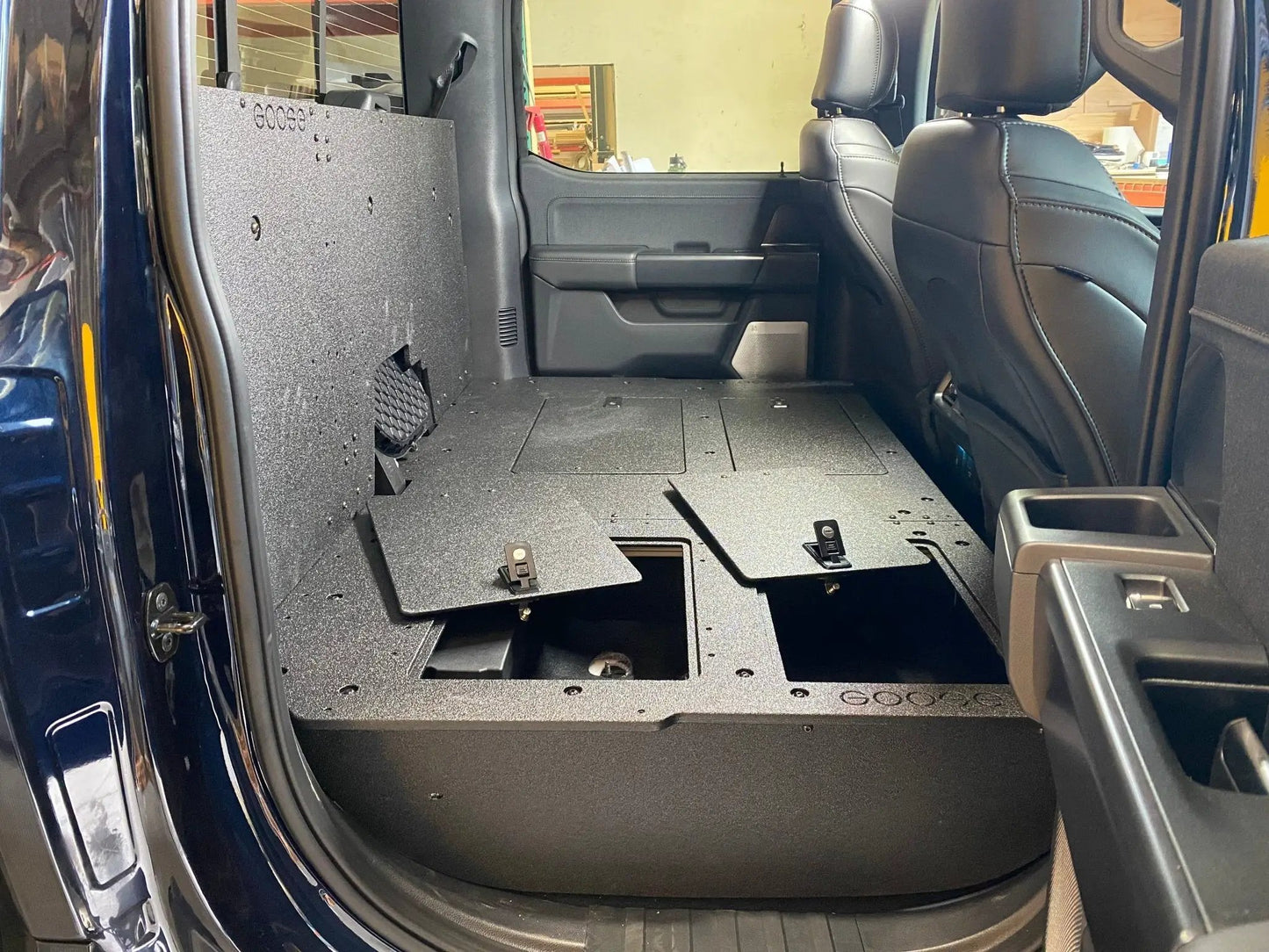 Ford - F150 2021-Present - 14th Gen. SuperCrew - Second Row Seat Delete Plate System with Factory B&O Subwoofer Center Wall with Exterior Port by Goose Gear