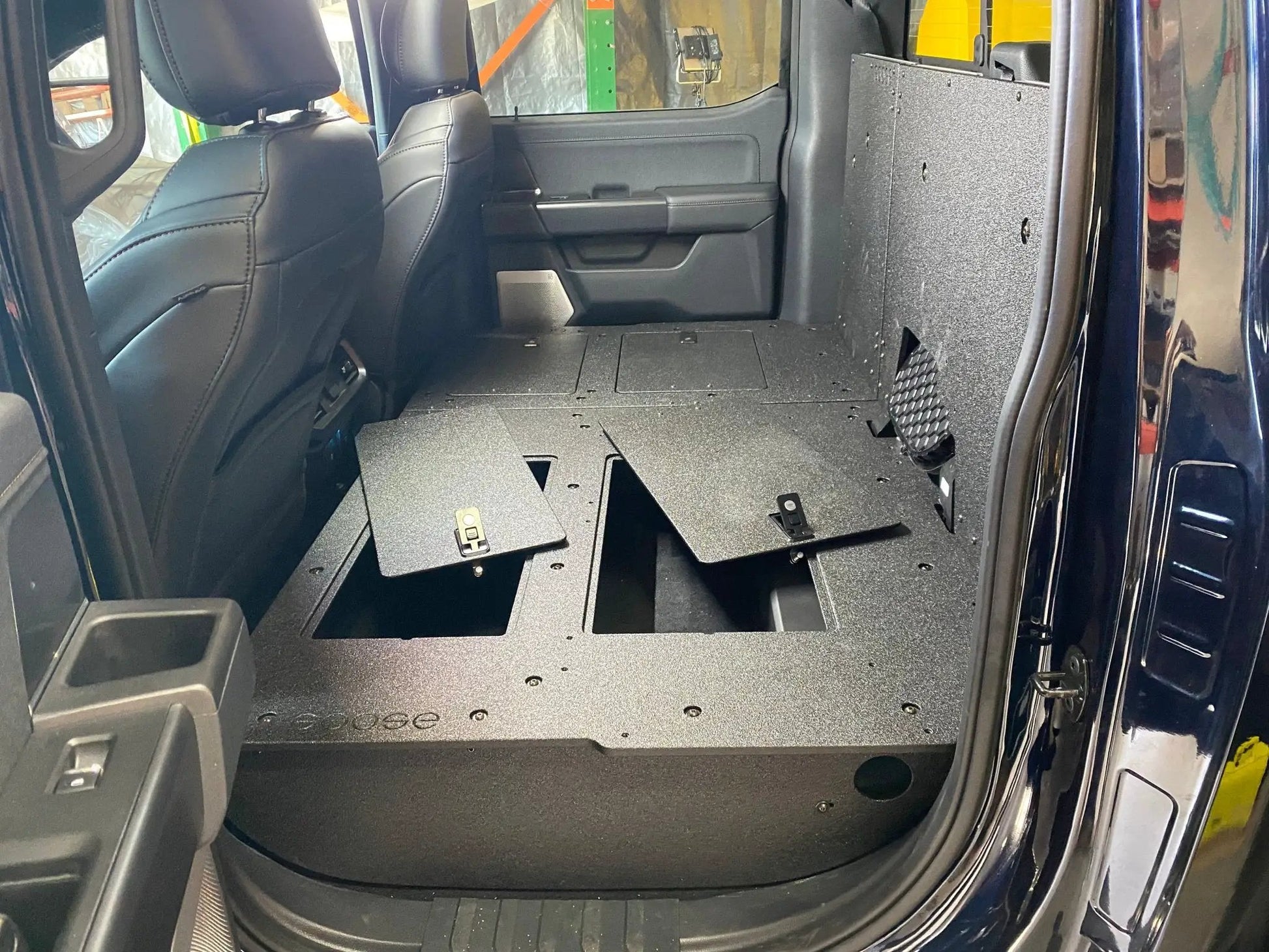 Ford - F150 2021-Present - 14th Gen. SuperCrew - Second Row Seat Delete Plate System with Factory B&O Subwoofer Center Wall with Exterior Port by Goose Gear