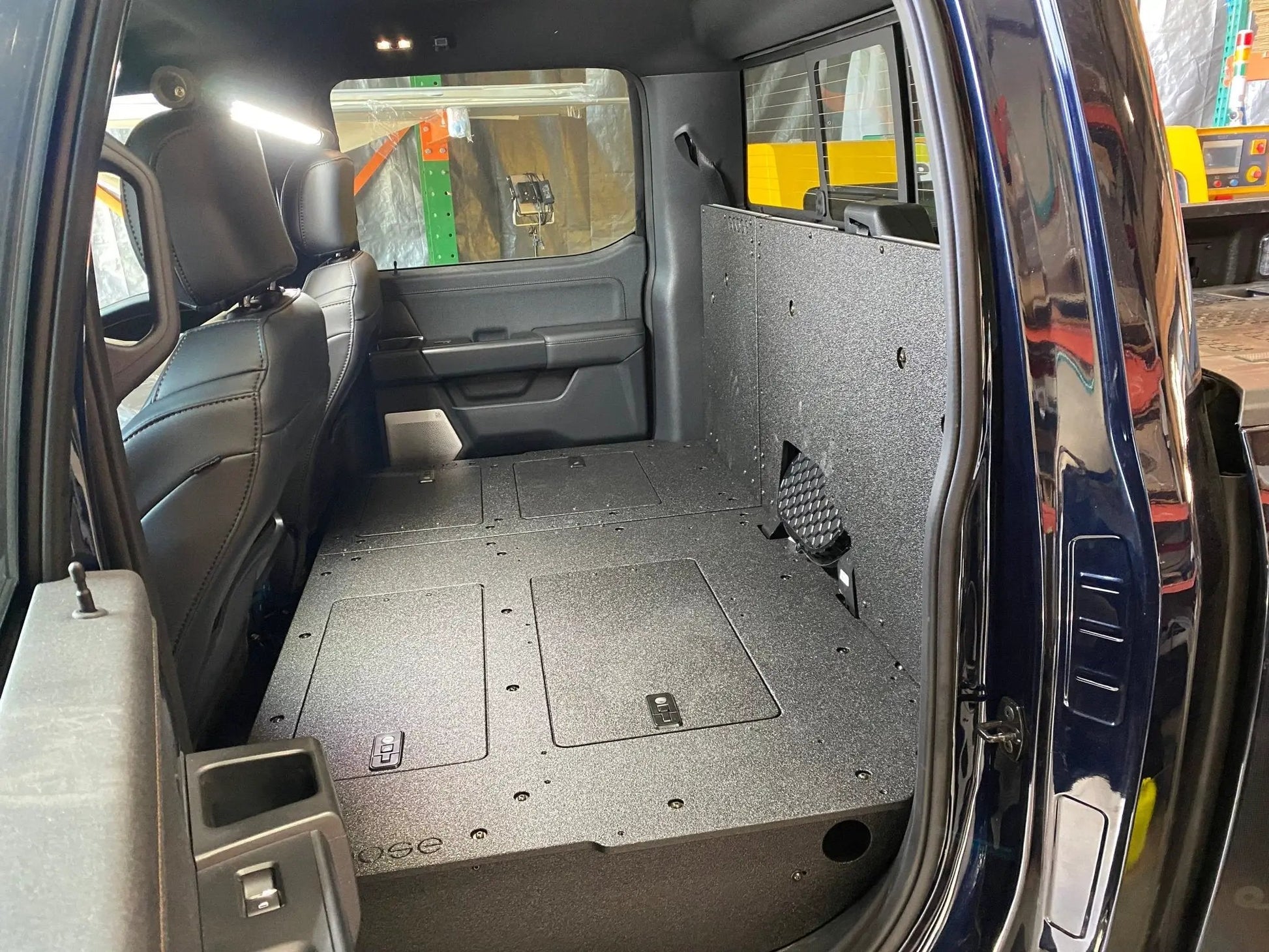 Ford Super Duty F250-F550 2017-Present 4th & 5th Gen. Crew Cab - Second Row Seat Delete Plate System by Goose Gear