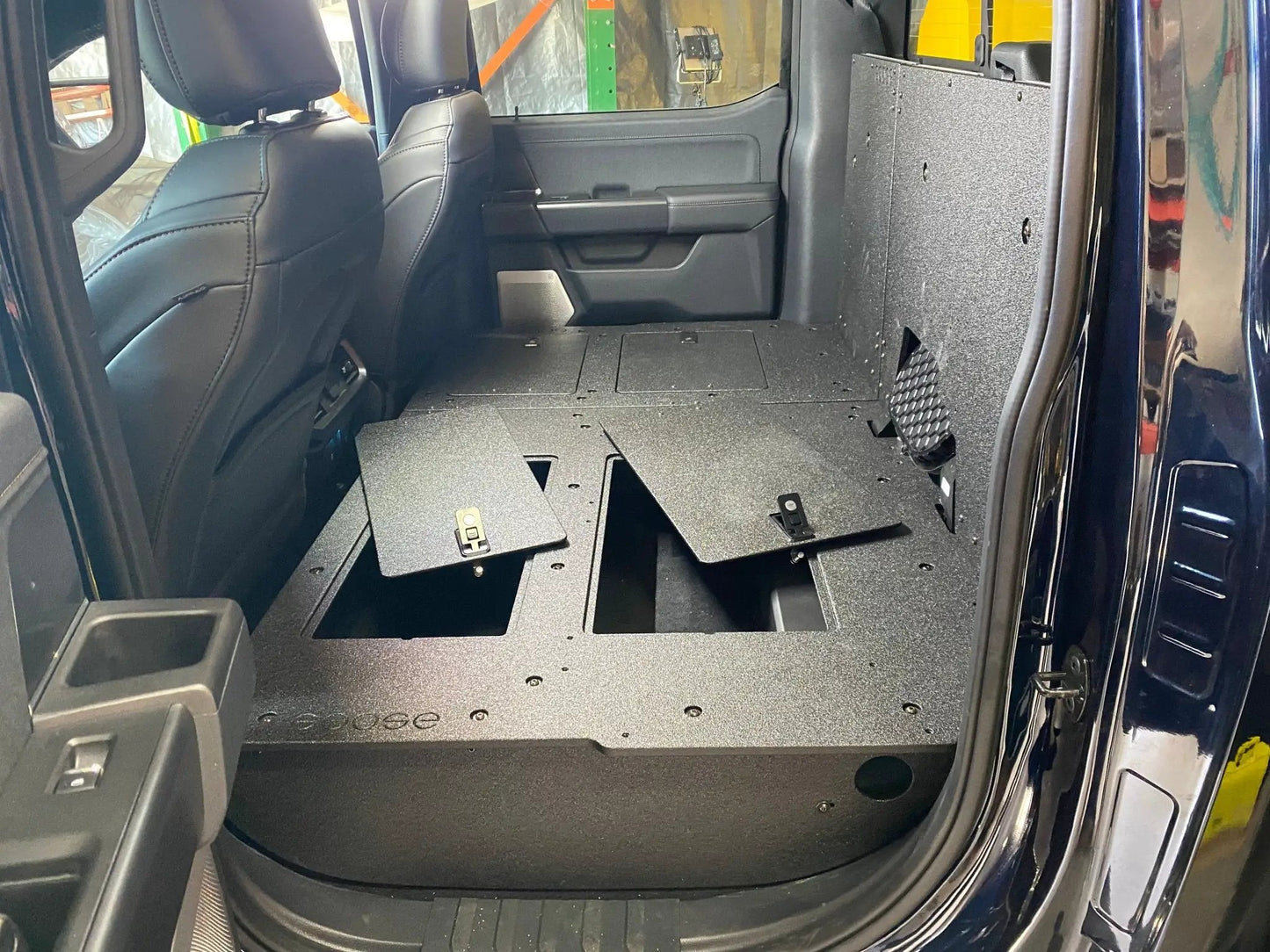 Ford Super Duty Ford - F250-F550 - 2023-Present - 5th Gen. Crew Cab - Second Row Seat Delete Plate System with Factory B&O Subwoofer Center Wall with Exterior Port by Goose Gear