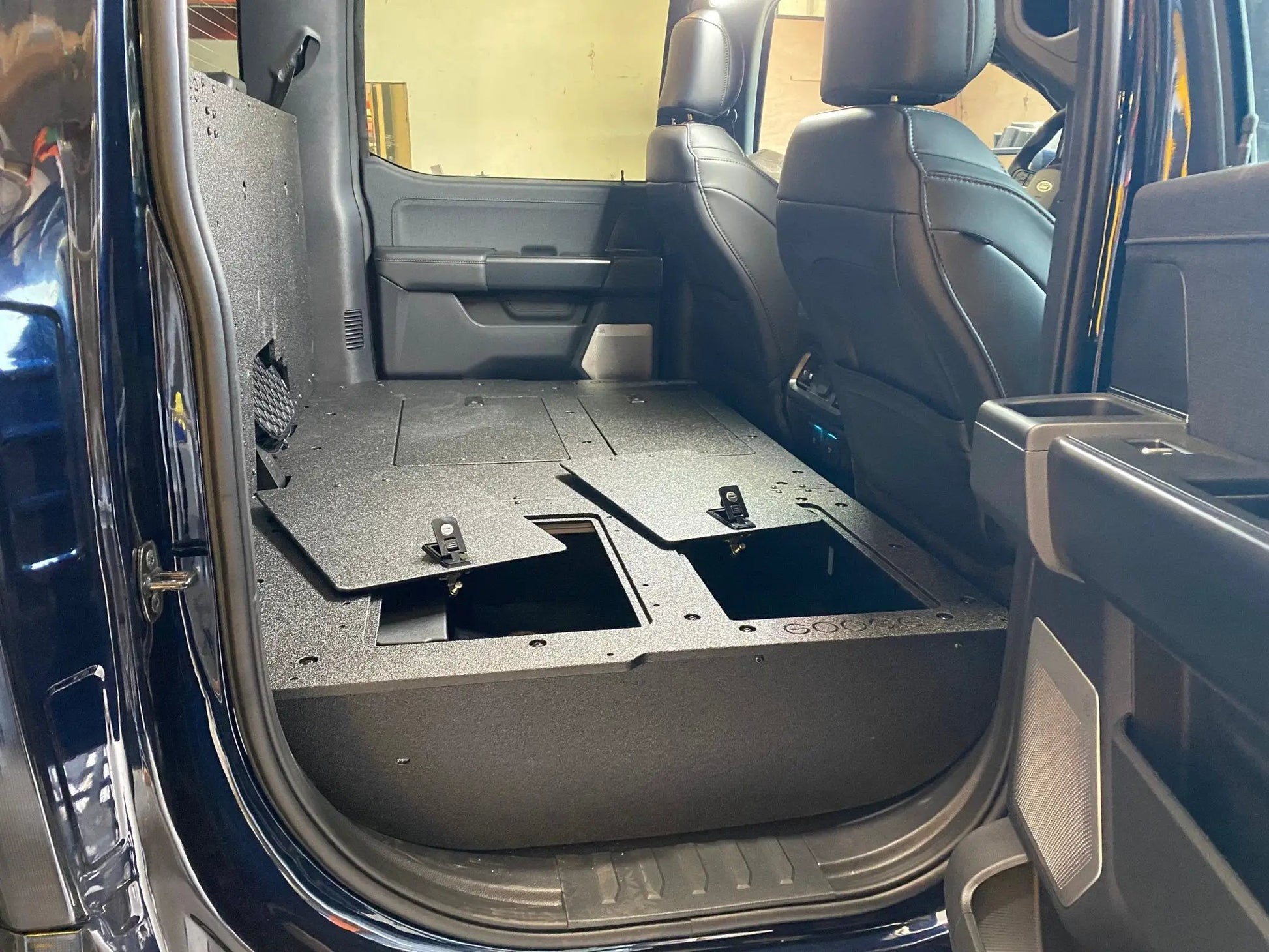Ford Super Duty Ford - F250-F550 - 2023-Present - 5th Gen. Crew Cab - Second Row Seat Delete Plate System with Factory B&O Subwoofer Center Wall with Exterior Port by Goose Gear