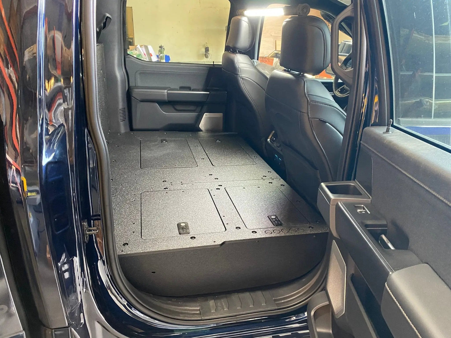 Ford Super Duty Ford - F250-F550 - 2023-Present - 5th Gen. Crew Cab - Second Row Seat Delete Plate System with Factory B&O Subwoofer Center Wall with Exterior Port by Goose Gear