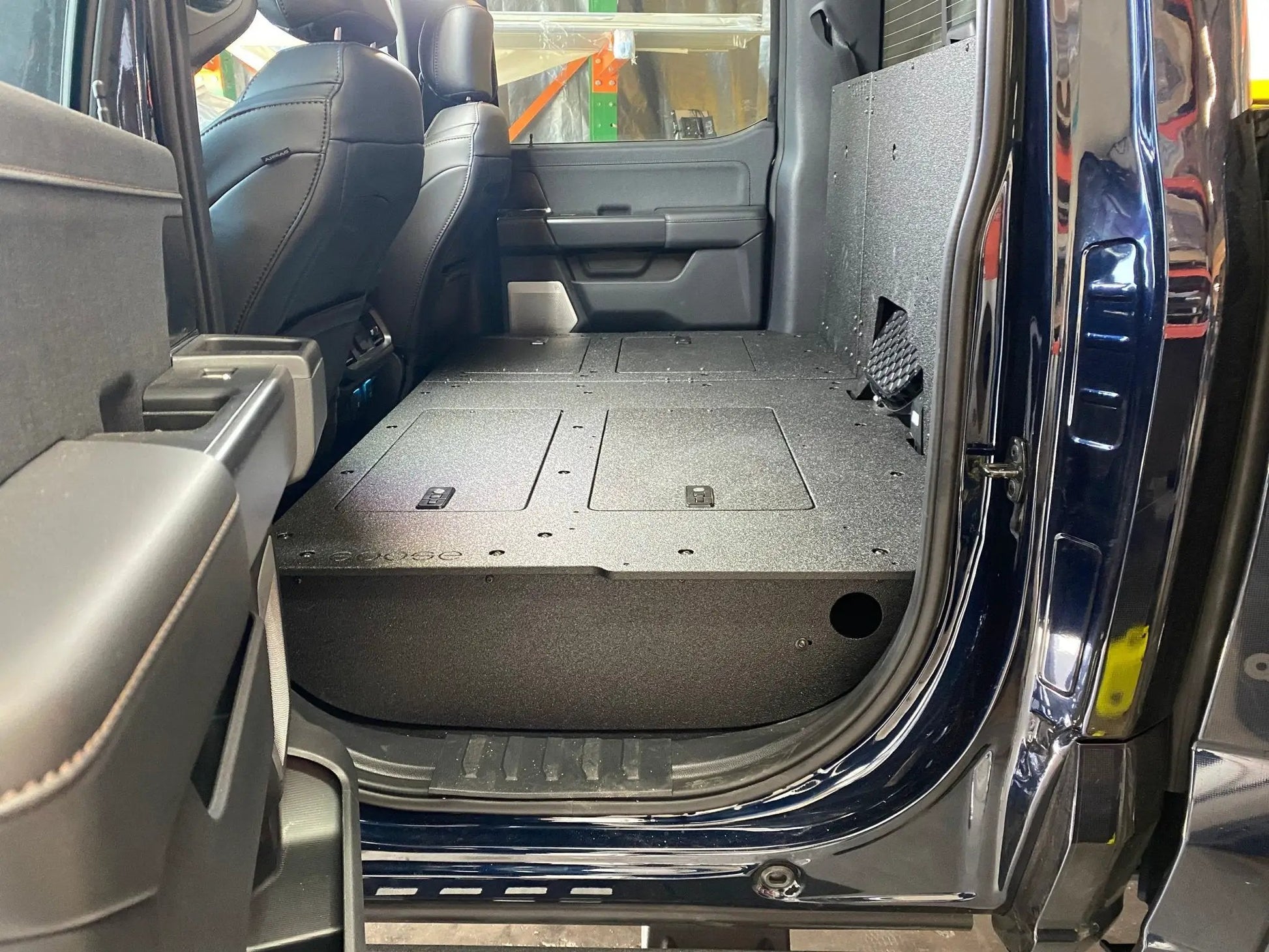 Ford Super Duty Ford - F250-F550 - 2023-Present - 5th Gen. Crew Cab - Second Row Seat Delete Plate System with Factory B&O Subwoofer Center Wall with Exterior Port by Goose Gear