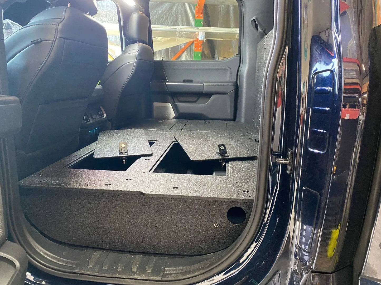 Ford Super Duty Ford - F250-F550 - 2023-Present - 5th Gen. Crew Cab - Second Row Seat Delete Plate System with Factory B&O Subwoofer Center Wall with Exterior Port by Goose Gear