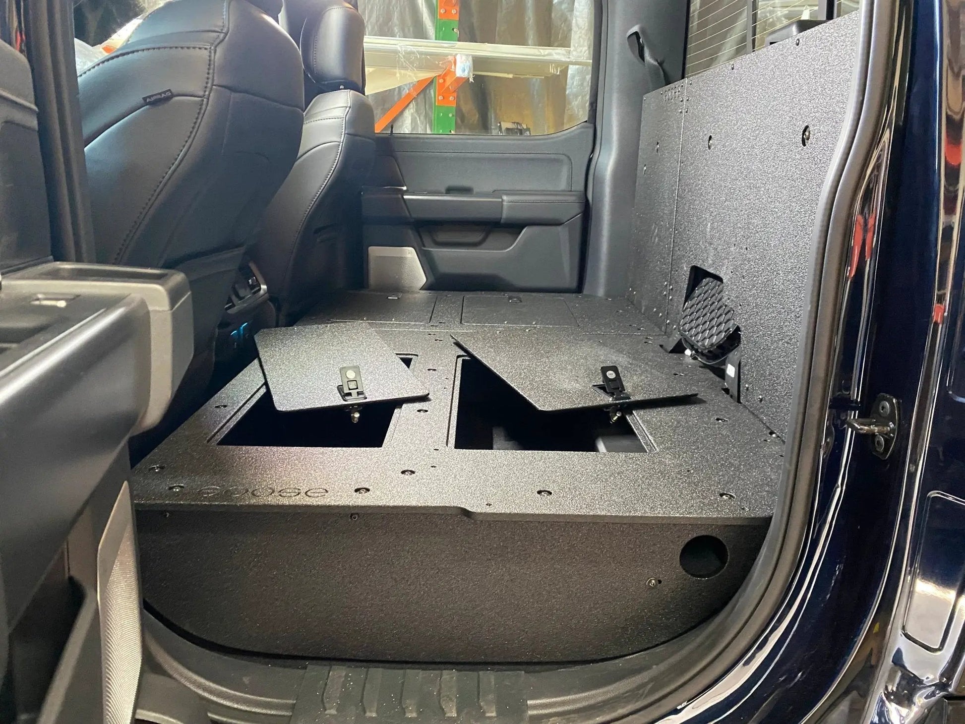 Ford Super Duty Ford - F250-F550 - 2023-Present - 5th Gen. Crew Cab - Second Row Seat Delete Plate System with Factory B&O Subwoofer Center Wall with Exterior Port by Goose Gear