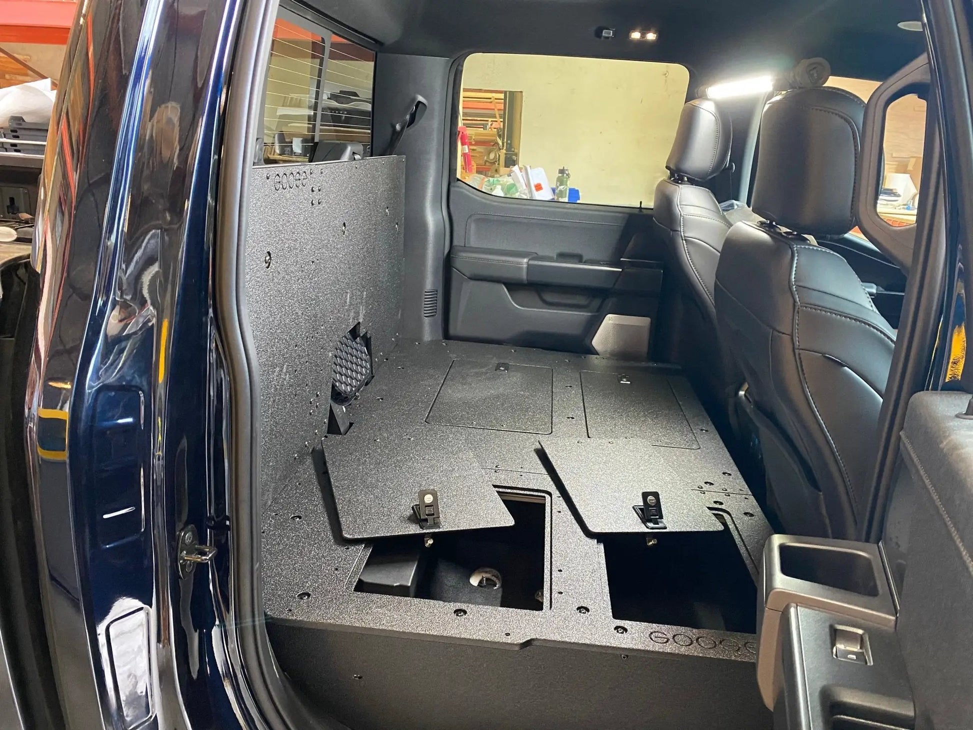 Ford Super Duty Ford - F250-F550 - 2023-Present - 5th Gen. Crew Cab - Second Row Seat Delete Plate System with Factory B&O Subwoofer Center Wall with Exterior Port by Goose Gear