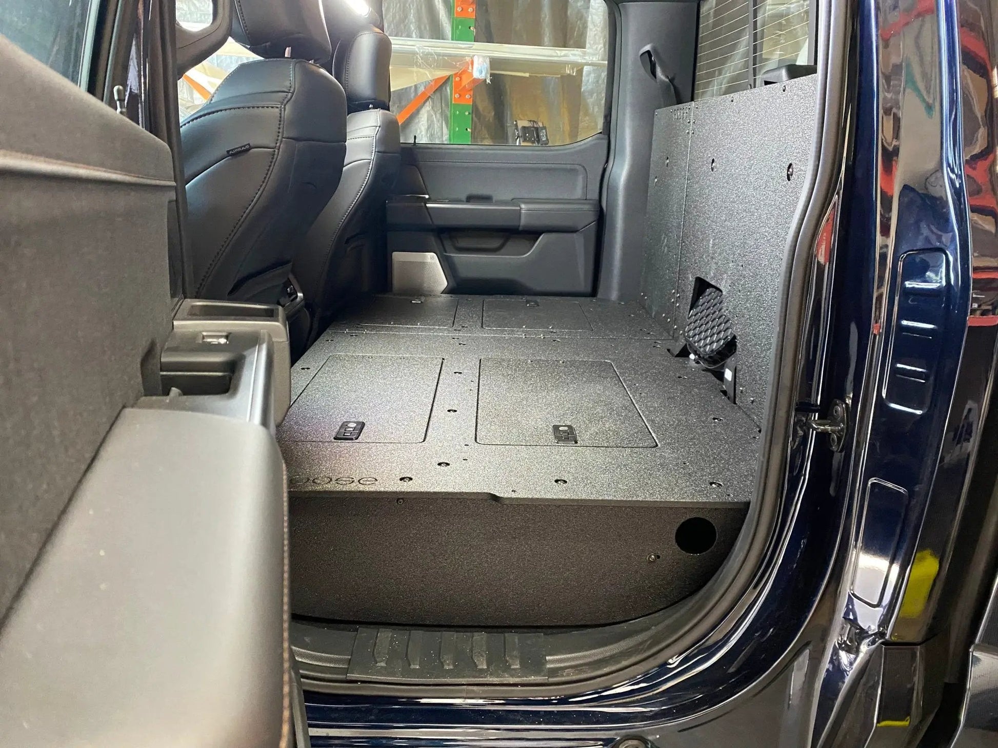 Ford Super Duty Ford - F250-F550 - 2023-Present - 5th Gen. Crew Cab - Second Row Seat Delete Plate System with Factory B&O Subwoofer Center Wall with Exterior Port by Goose Gear