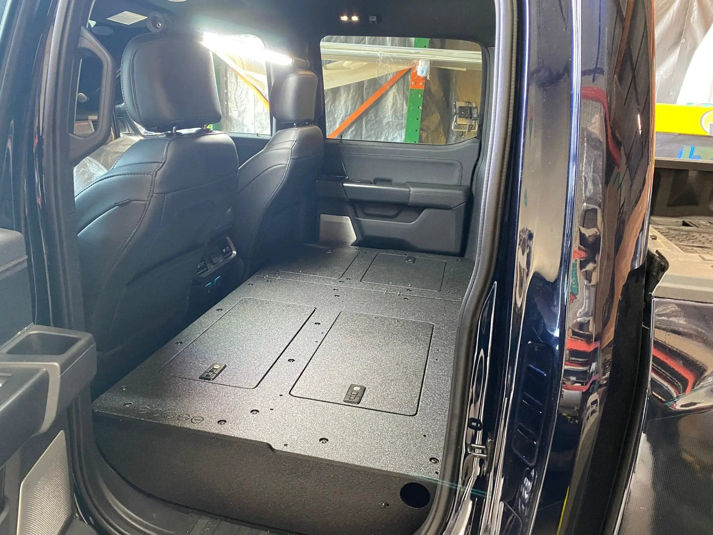 Ford Super Duty Ford - F250-F550 - 2023-Present - 5th Gen. Crew Cab - Second Row Seat Delete Plate System with Factory B&O Subwoofer Center Wall with Exterior Port by Goose Gear