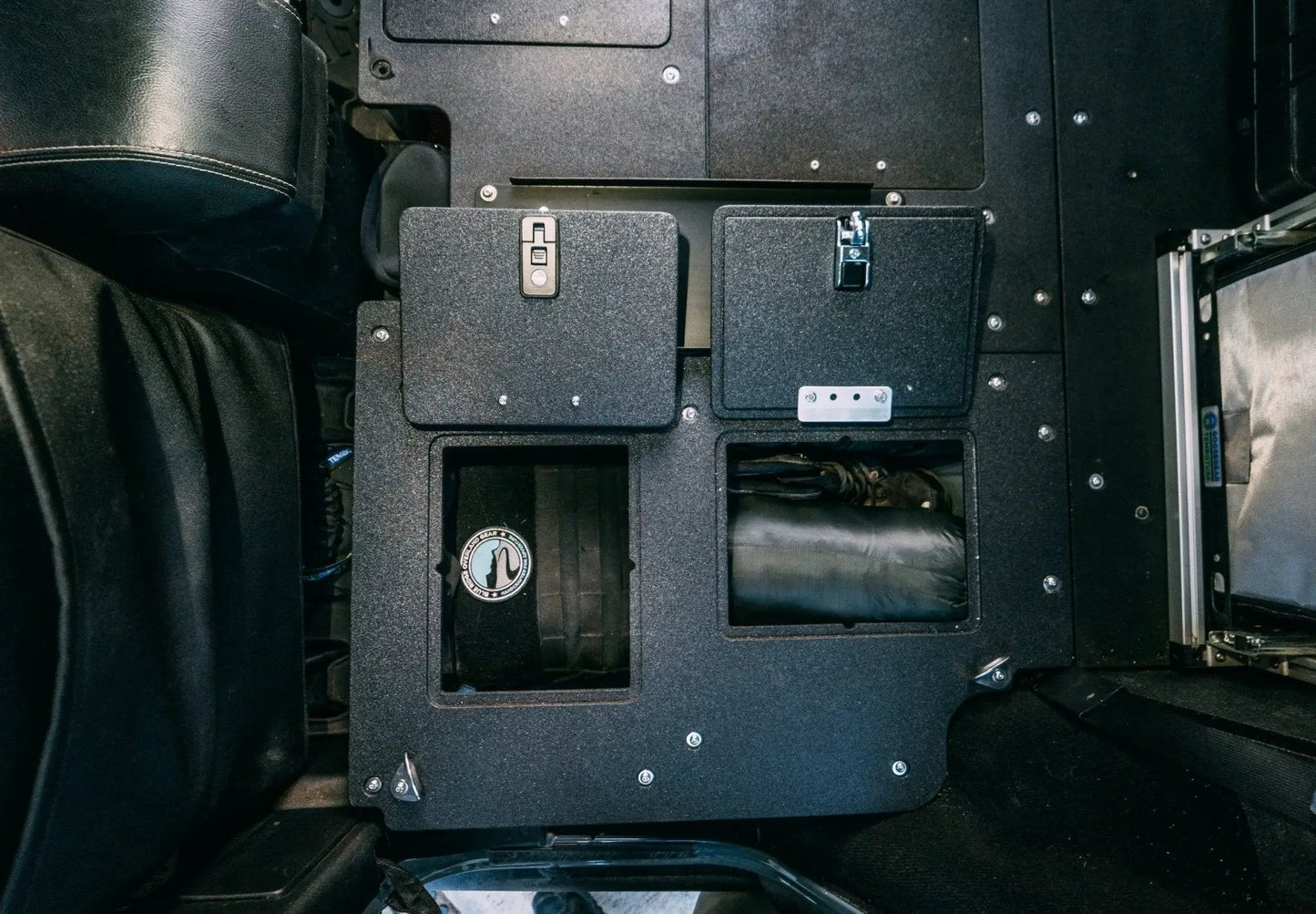 Legacy Product - Jeep Wrangler 2007-2018 JKU 4 Door - Second Row Seat Delete Plate System by Goose Gear