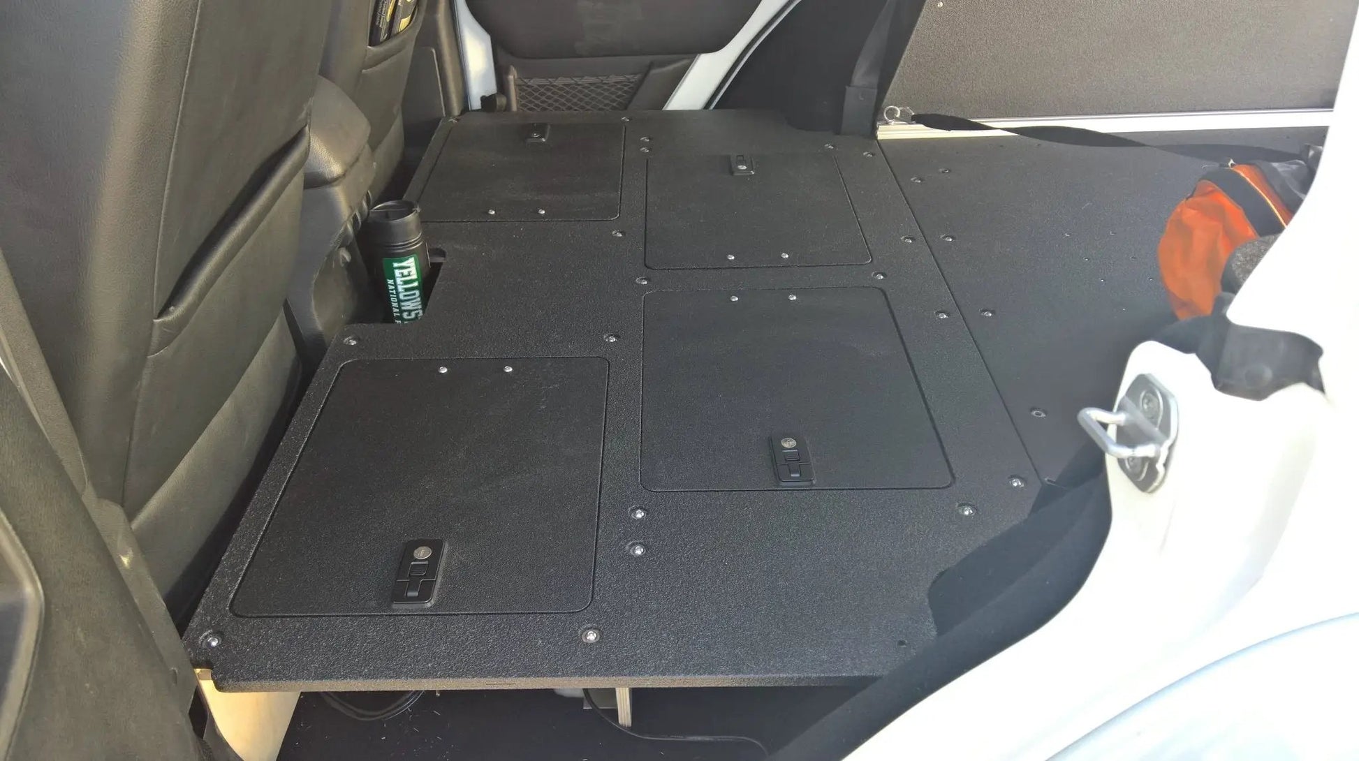 Legacy Product - Jeep Wrangler 2007-2018 JKU 4 Door - Second Row Seat Delete Plate System by Goose Gear