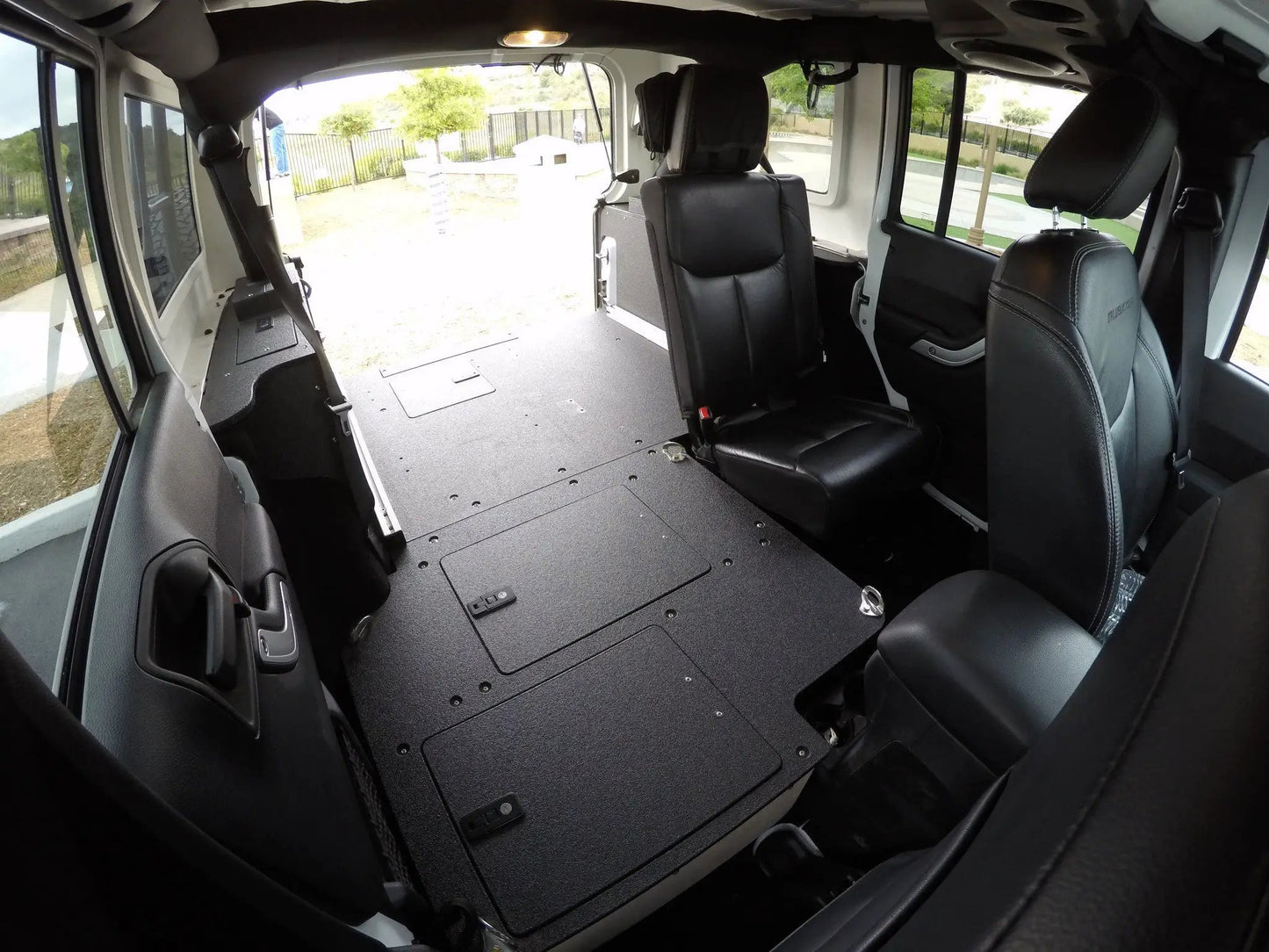 Legacy Product - Jeep Wrangler 2007-2018 JKU 4 Door - Second Row Seat Delete Plate System by Goose Gear