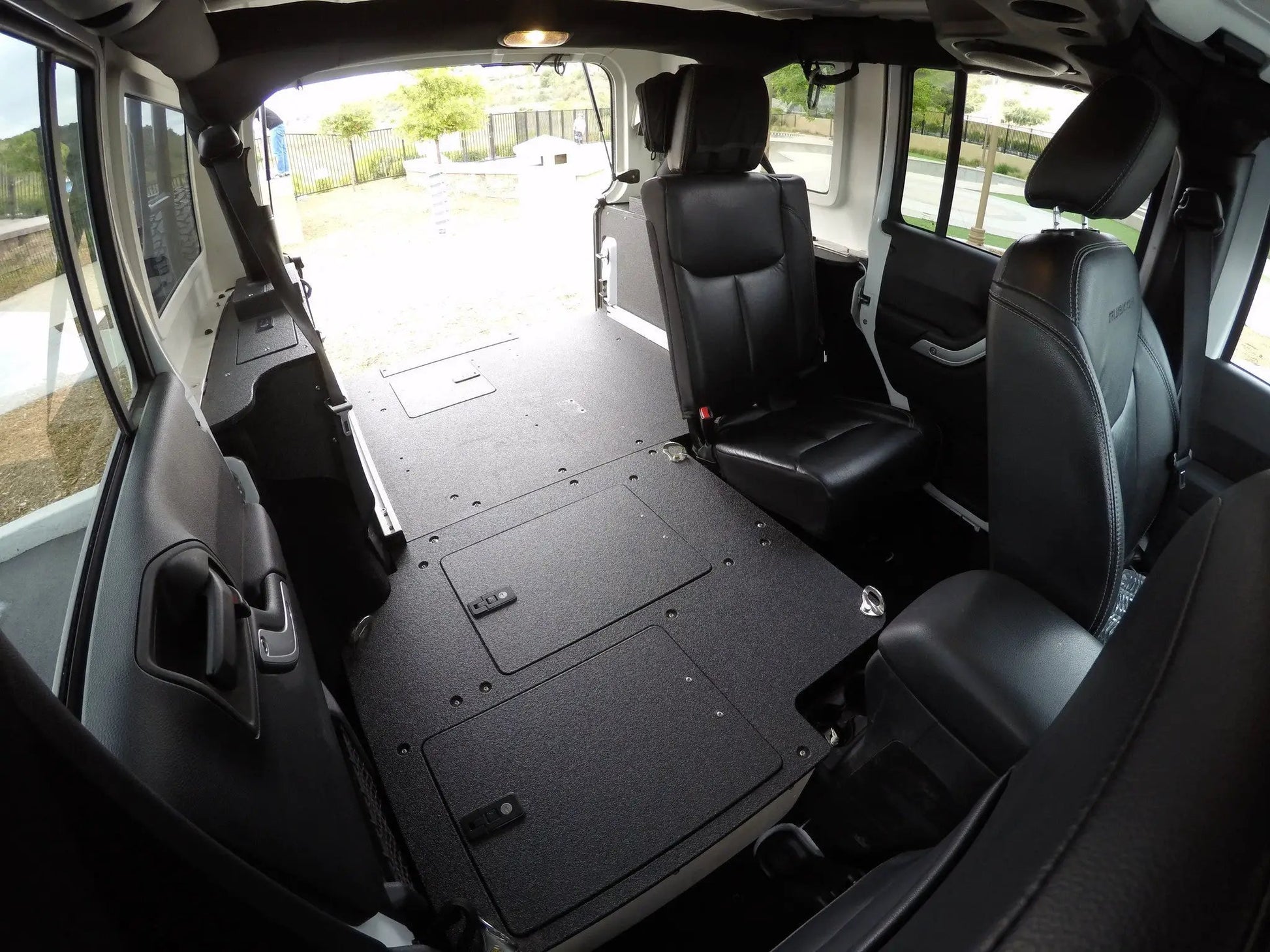 Legacy Product - Jeep Wrangler 2007-2018 JKU 4 Door - Second Row Seat Delete Plate System by Goose Gear