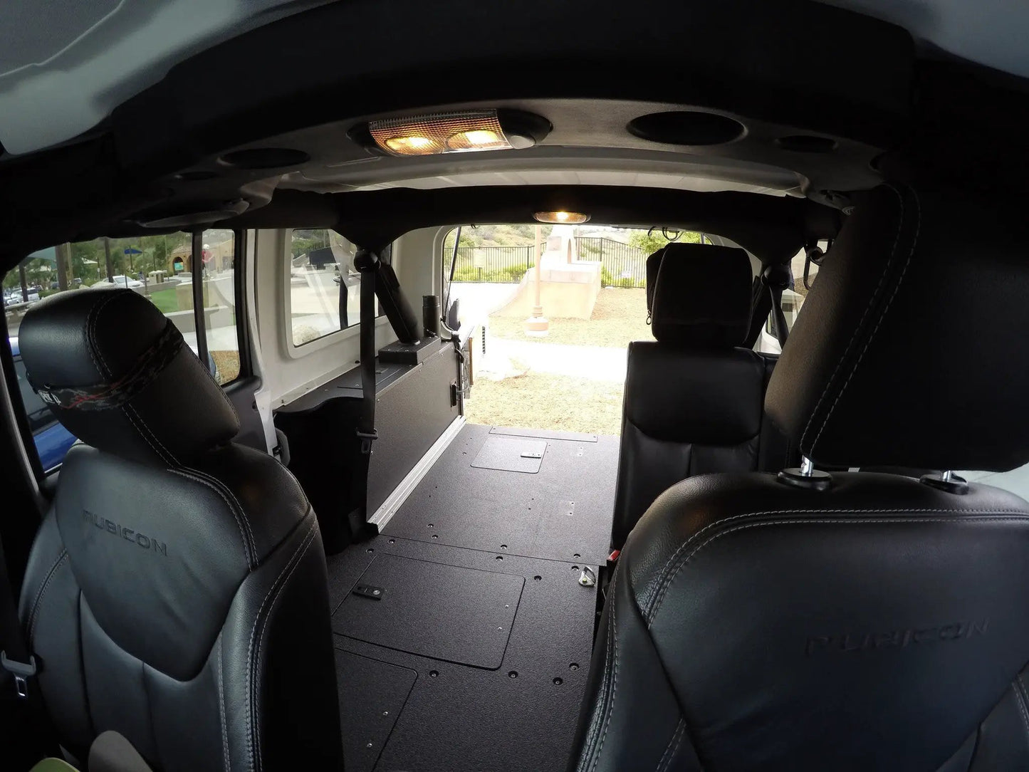 Legacy Product - Jeep Wrangler 2007-2018 JKU 4 Door - Second Row Seat Delete Plate System by Goose Gear