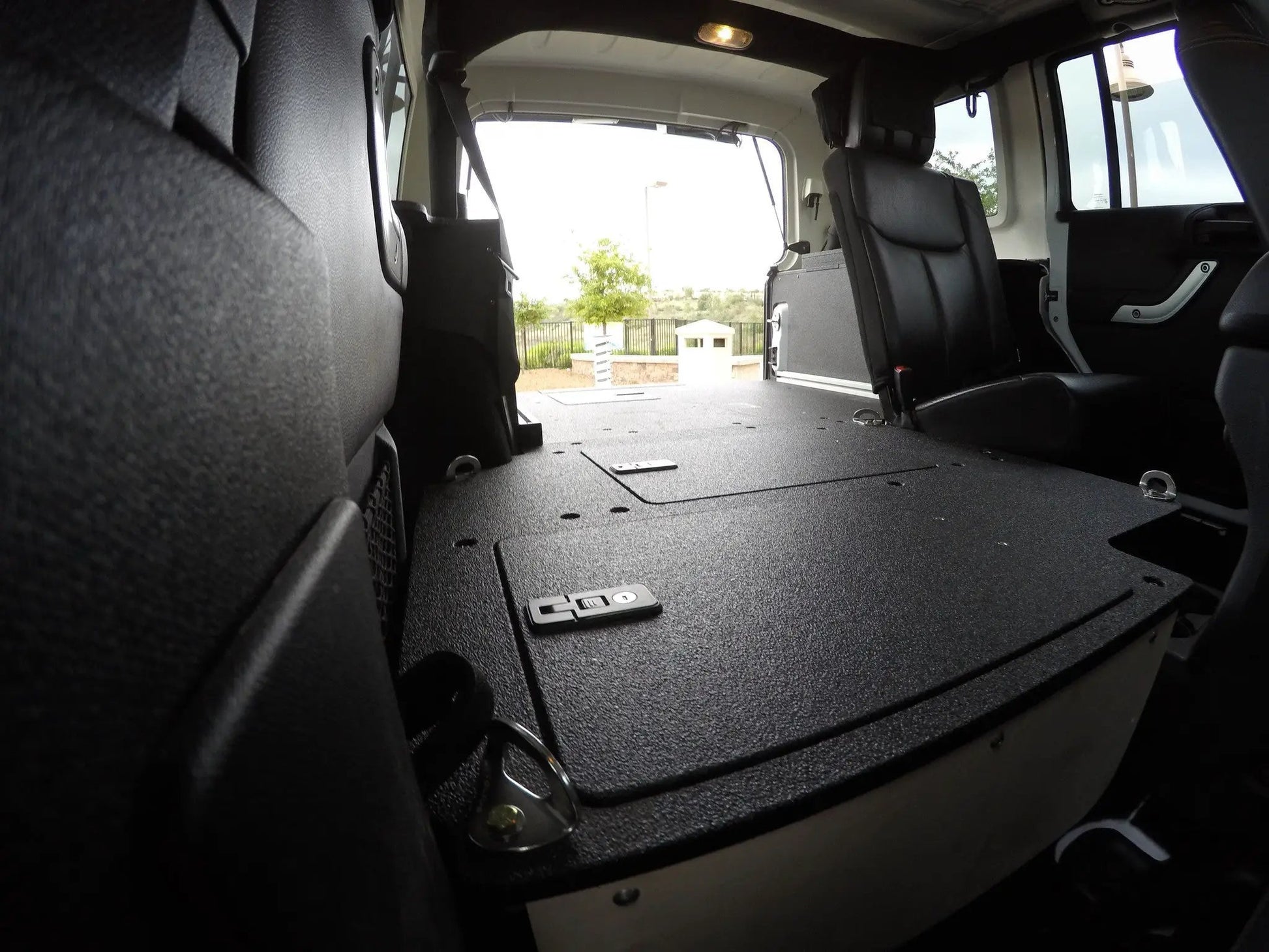 Legacy Product - Jeep Wrangler 2007-2018 JKU 4 Door - Second Row Seat Delete Plate System by Goose Gear