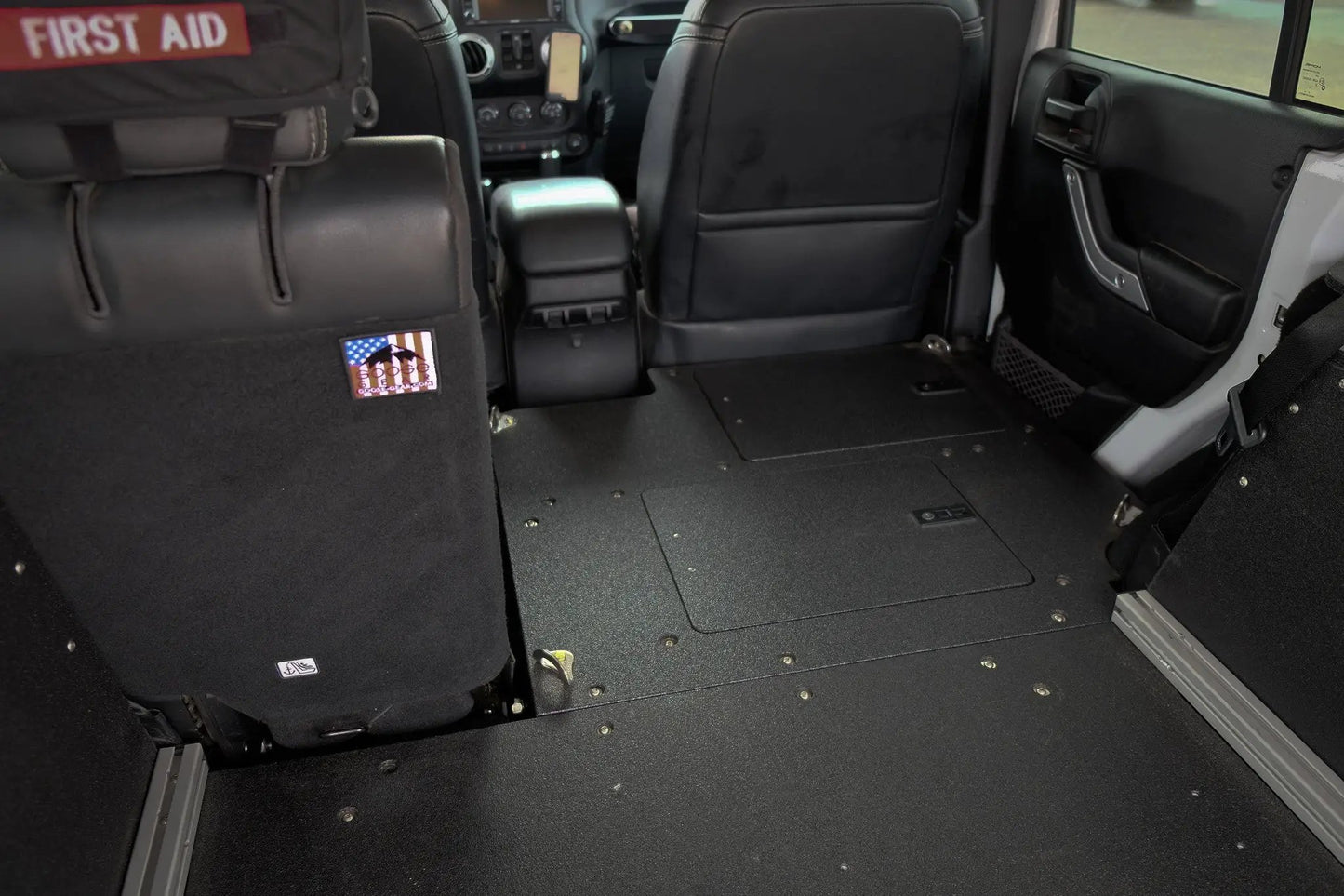 Legacy Product - Jeep Wrangler 2007-2018 JKU 4 Door - Second Row Seat Delete Plate System by Goose Gear