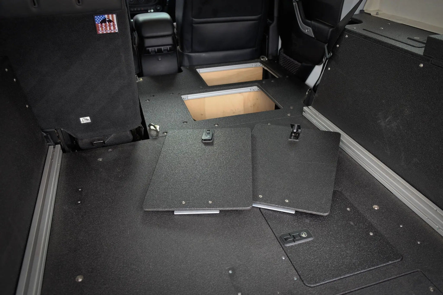 Legacy Product - Jeep Wrangler 2007-2018 JKU 4 Door - Second Row Seat Delete Plate System by Goose Gear