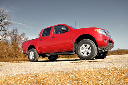 Rough Country 2.5 Inch Leveling Kit | Red Spacers | Nissan Frontier (05-26)/Xterra (05-15) by Rough Country