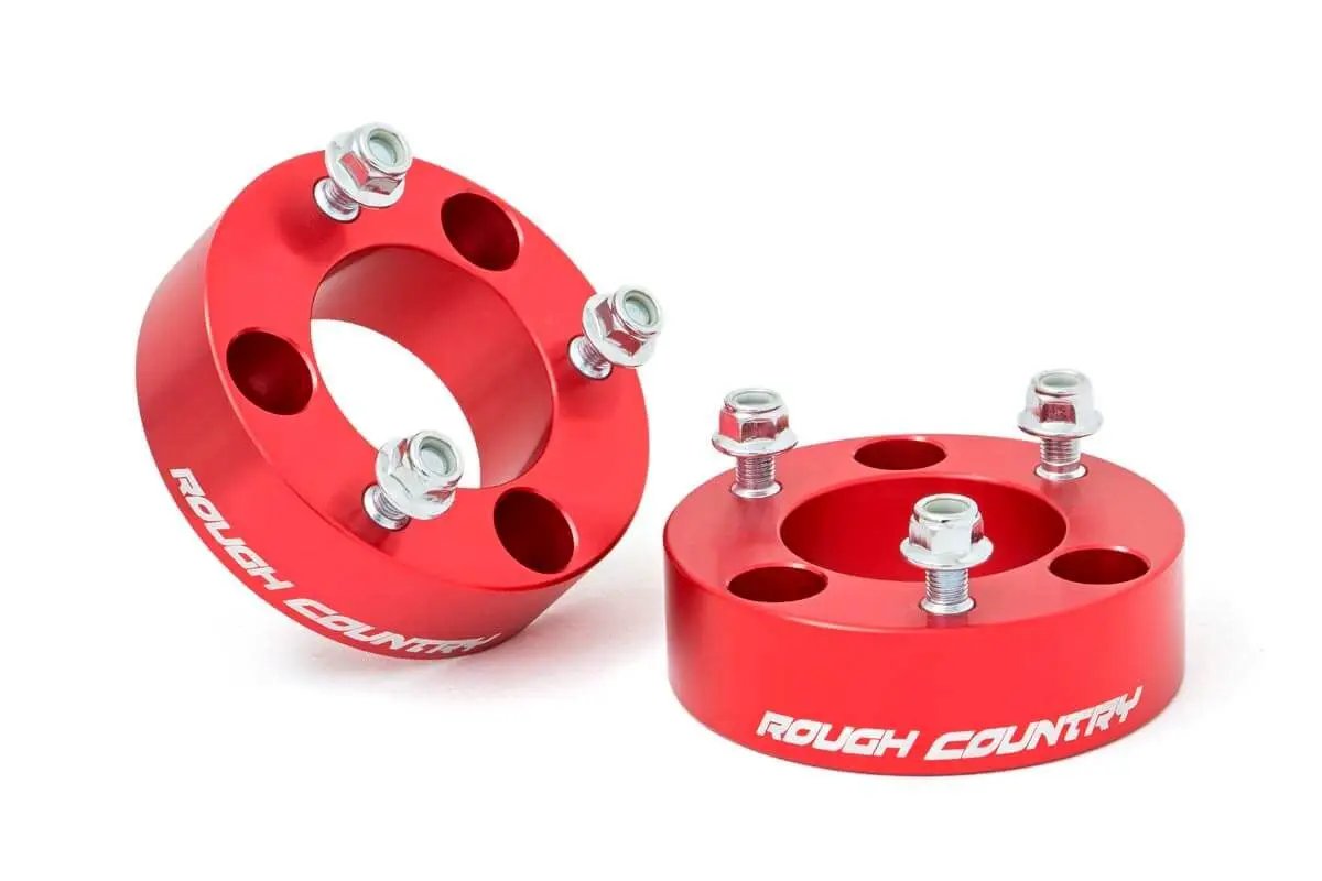 Rough Country 2.5 Inch Leveling Kit | Red Spacers | Nissan Frontier (05-26)/Xterra (05-15) by Rough Country