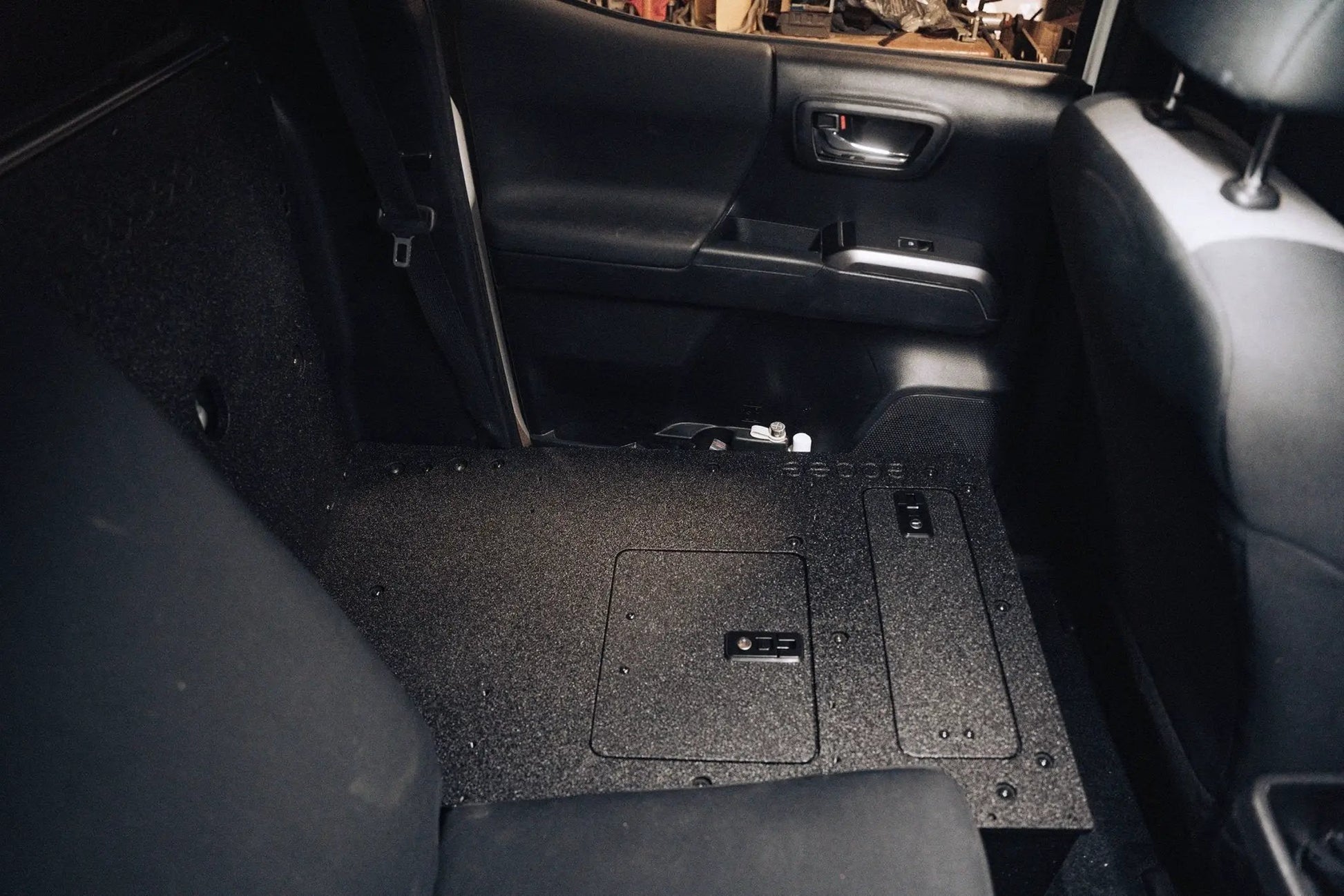 Toyota Tacoma 2005-2023 2nd and 3rd Gen Double Cab Version 2 - Second Row Seat Delete Plate System by Goose Gear