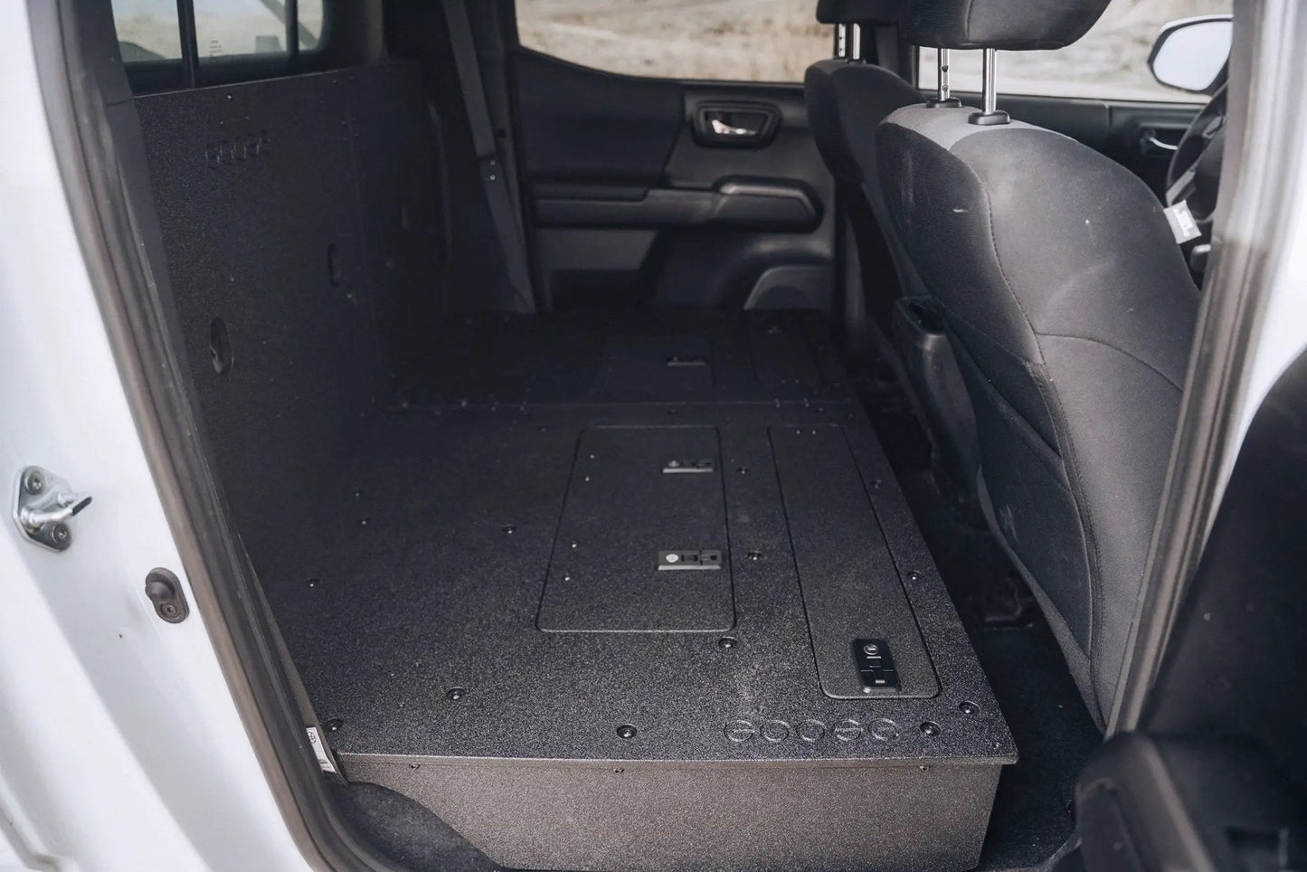 Toyota Tacoma 2005-2023 2nd and 3rd Gen Double Cab Version 2 - Second Row Seat Delete Plate System by Goose Gear