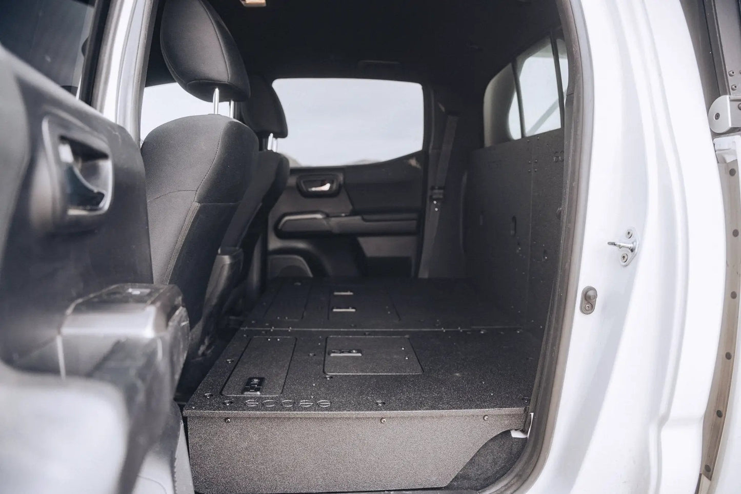 Toyota Tacoma 2005-2023 2nd and 3rd Gen Double Cab Version 2 - Second Row Seat Delete Plate System by Goose Gear